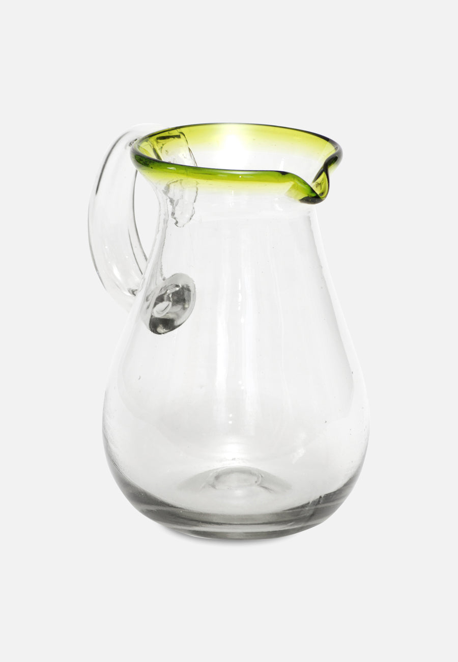 glass carafe with green rim from the front