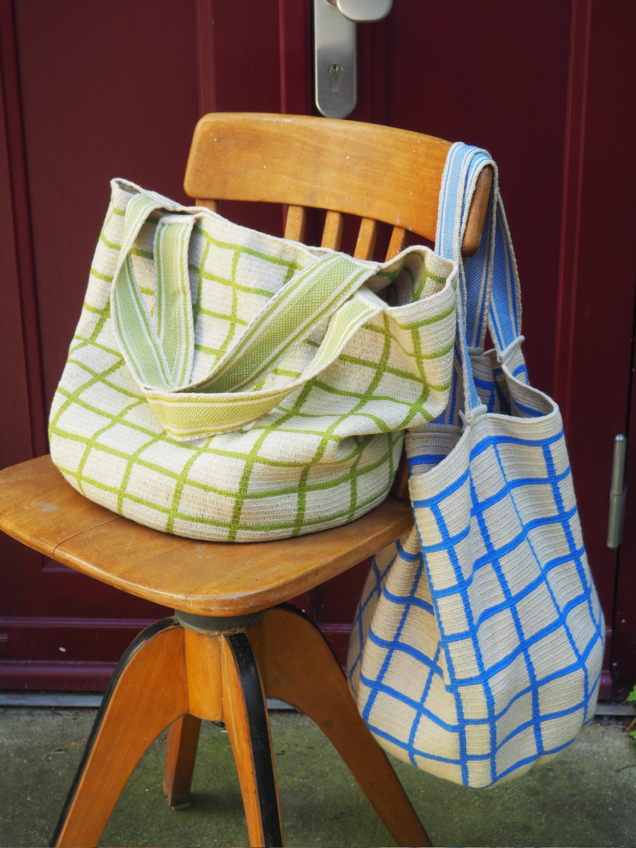 one green checkered cotton bag and one blue checkered cotton bag